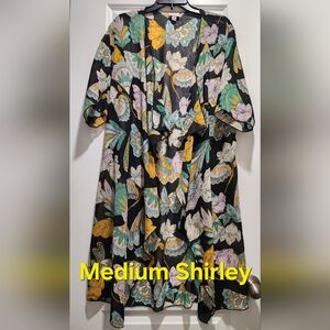 Lularoe Shirley size medium but fits larger.